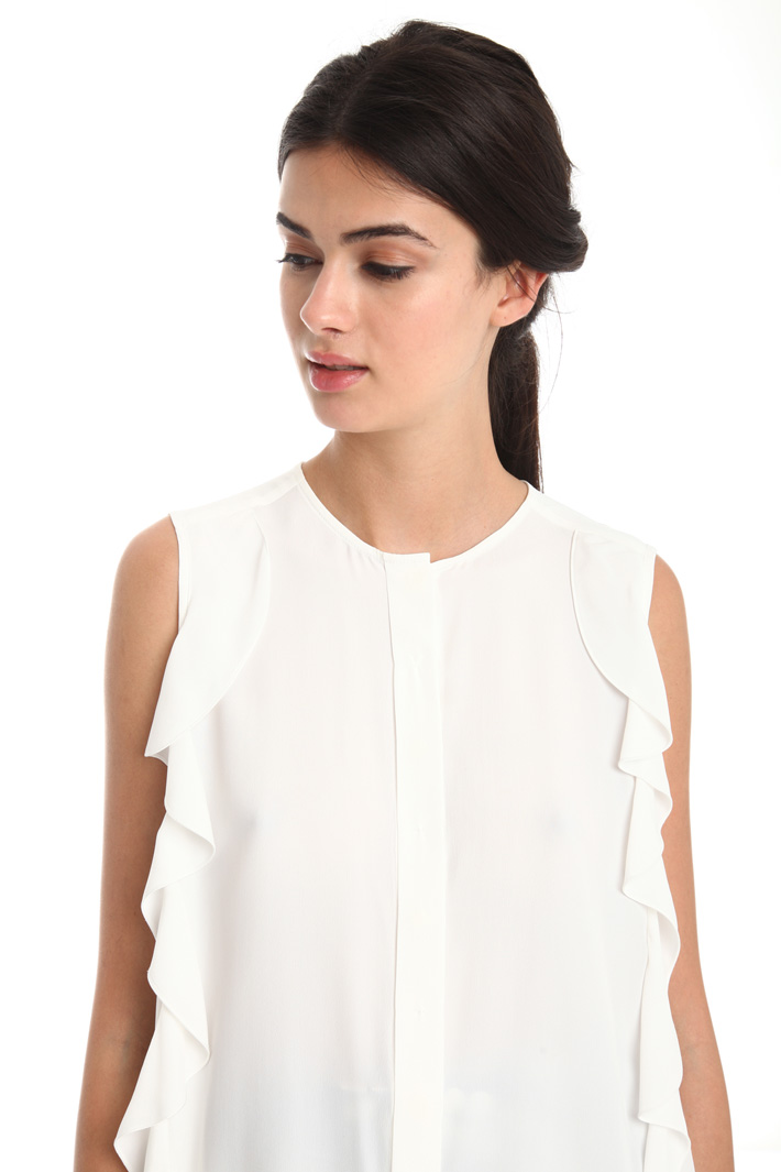 Top smanicato con ruches Intrend Top smanicato con ruches Intrend