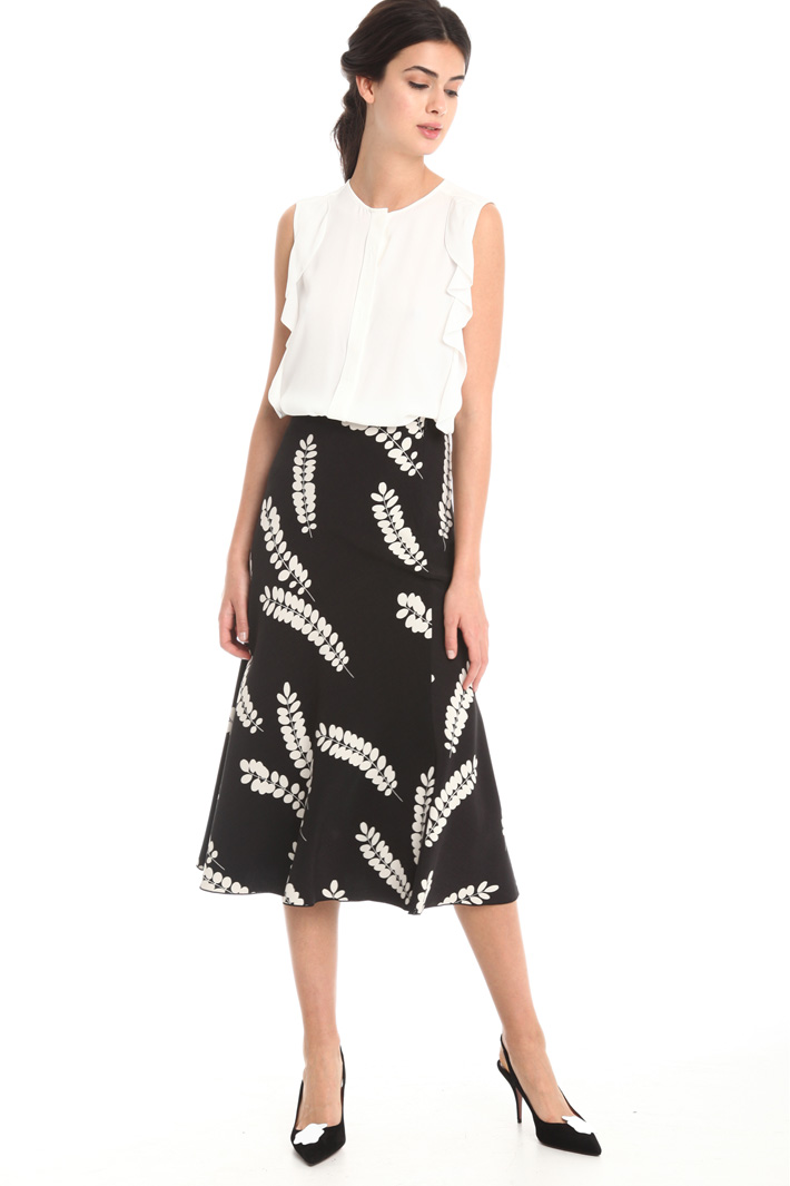 Top smanicato con ruches Intrend Top smanicato con ruches Intrend