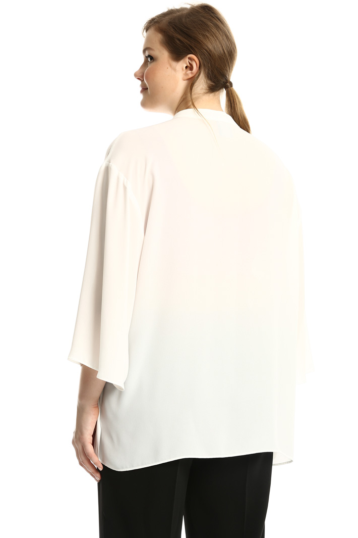 Blouse with jeweled embroidery
Intrend Blouse with jeweled embroidery
Intrend