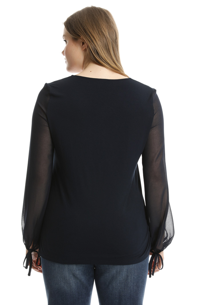 Jersey and fabric tunic
Intrend Jersey and fabric tunic
Intrend