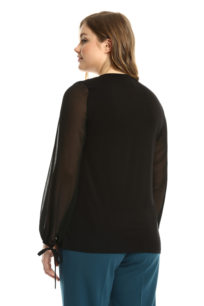 Jersey and fabric tunic
Intrend Jersey and fabric tunic
Intrend