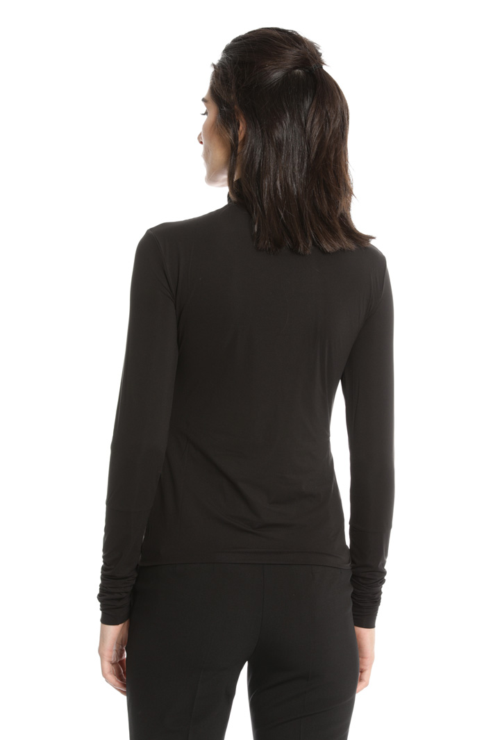 Stretch turtleneck top
Intrend Stretch turtleneck top
Intrend