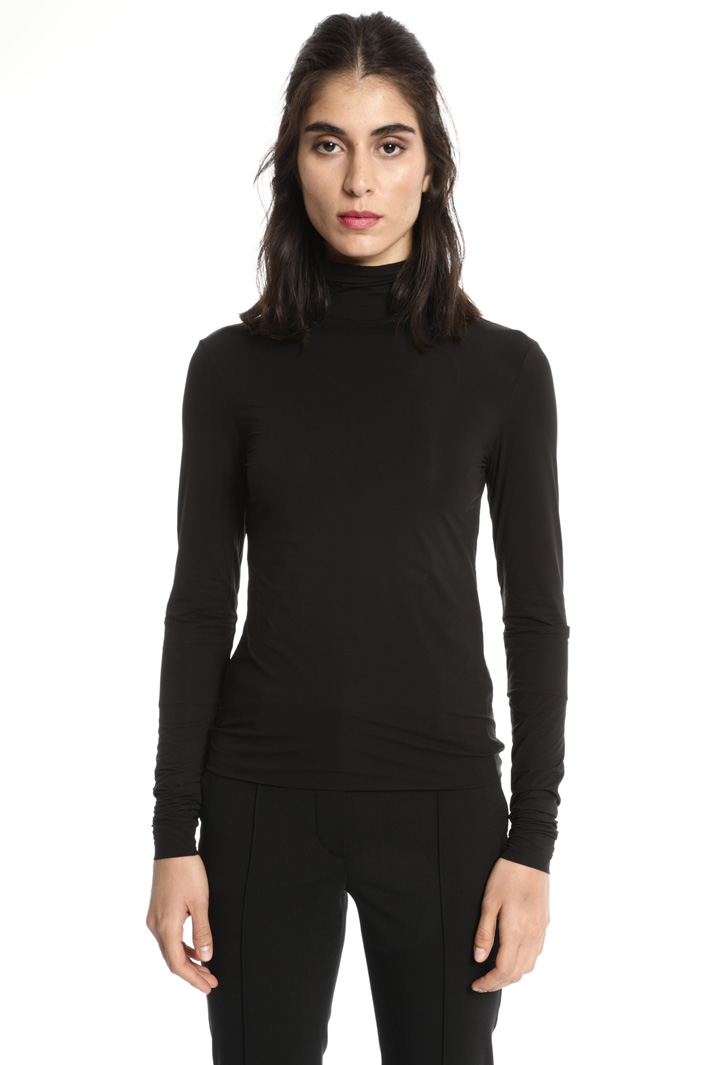Stretch turtleneck top
Intrend Stretch turtleneck top
Intrend