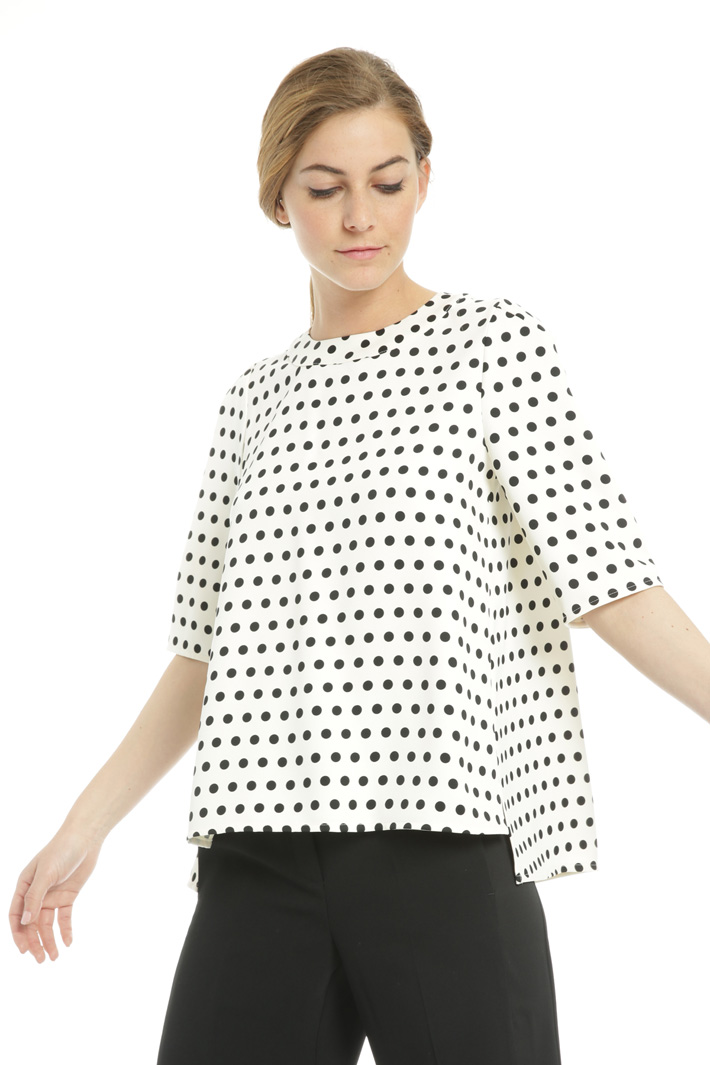 Flared polka dot blouse
Intrend Flared polka dot blouse
Intrend