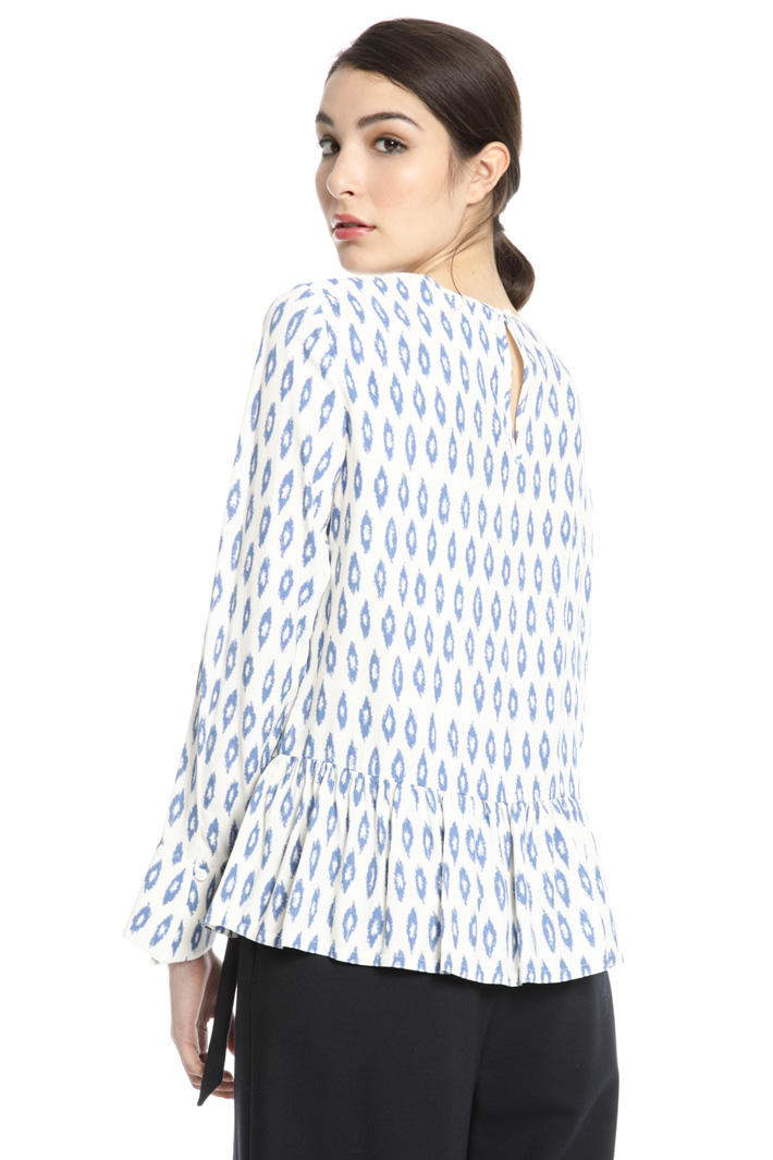 Viscose blouse with flounce
Intrend Viscose blouse with flounce
Intrend