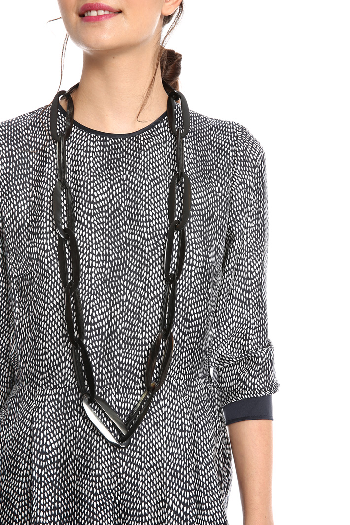 Long horn necklace
Intrend Long horn necklace
Intrend