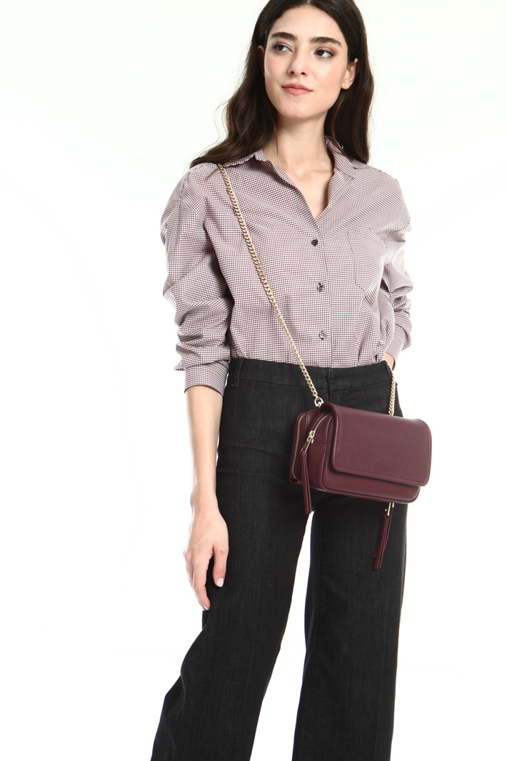 Mini bag with chain strap
Intrend Mini bag with chain strap
Intrend