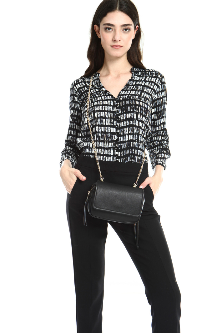 Mini bag with chain strap
Intrend Mini bag with chain strap
Intrend