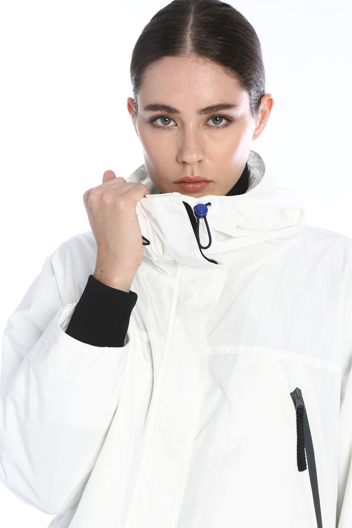 Hooded raincoat Intrend Hooded raincoat Intrend