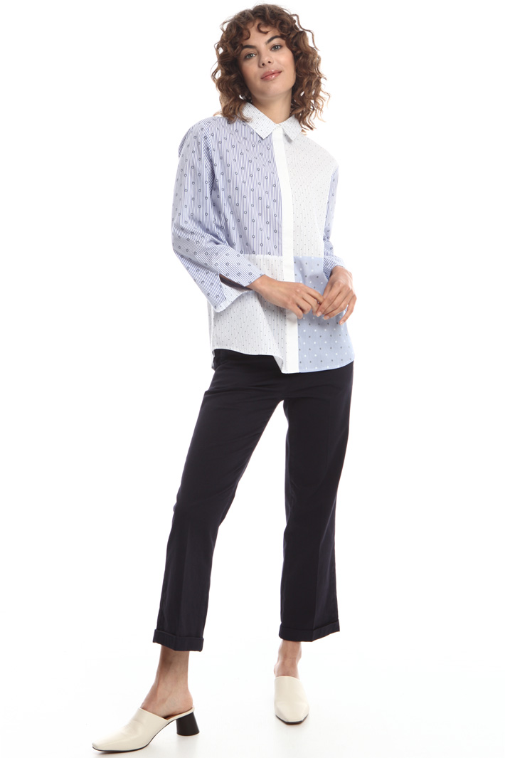Loose-fit poplin shirt
Intrend Loose-fit poplin shirt
Intrend