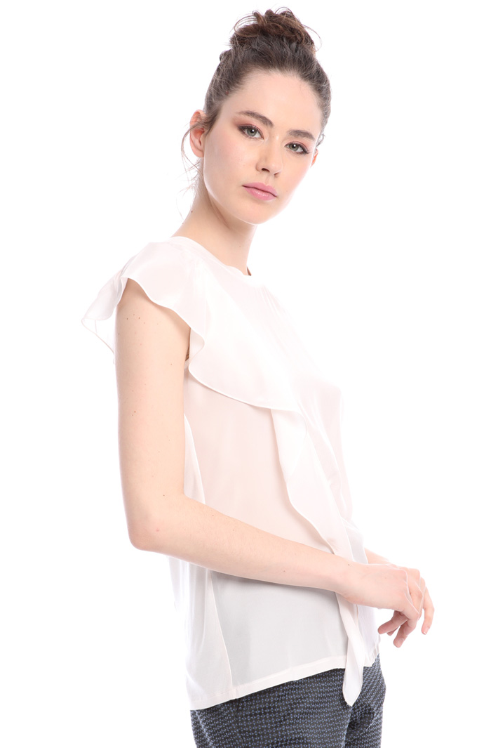 Ruffle detail blouse
Intrend Ruffle detail blouse
Intrend