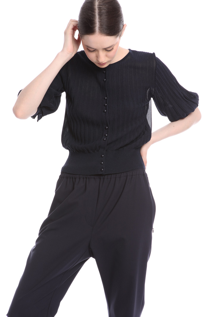 Short sleeved cardigan
Intrend Short sleeved cardigan
Intrend