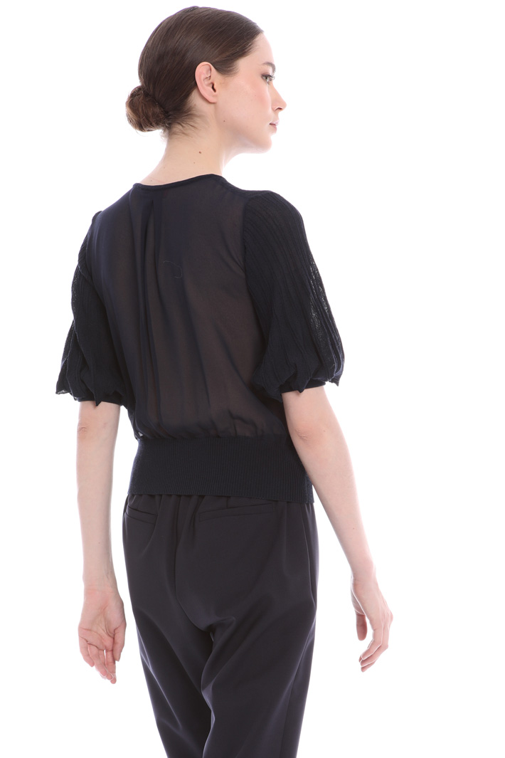 Short sleeved cardigan
Intrend Short sleeved cardigan
Intrend