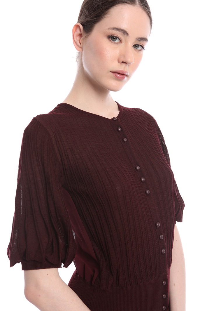 Short sleeved cardigan
Intrend Short sleeved cardigan
Intrend