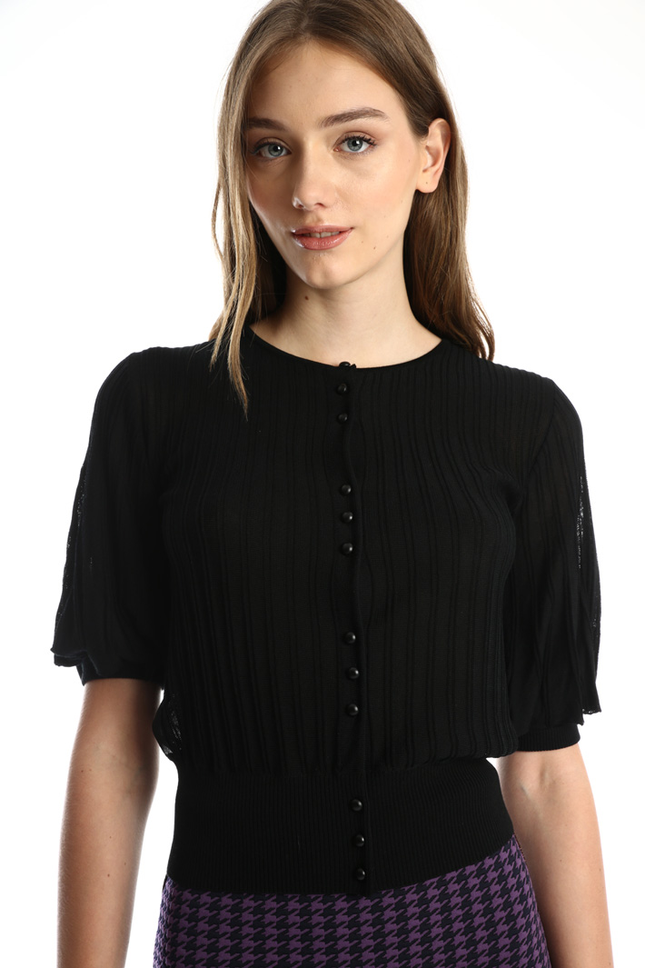 Short sleeved cardigan
Intrend Short sleeved cardigan
Intrend