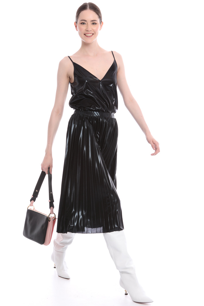 Metallic pleated midi-skirt
Intrend Metallic pleated midi-skirt
Intrend