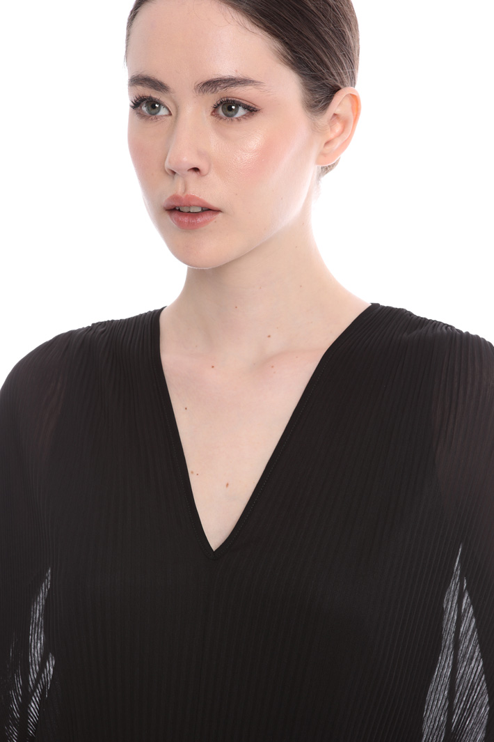 Crepe jersey bodysuit
Intrend Crepe jersey bodysuit
Intrend