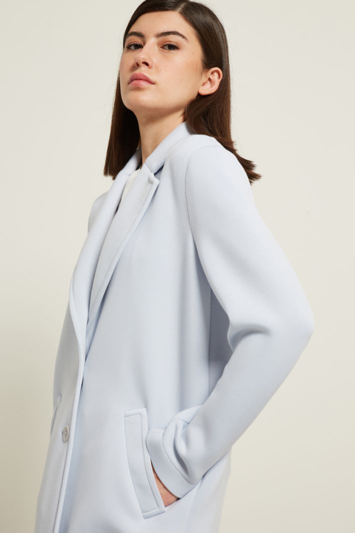 Cappotto con tasche oblique
