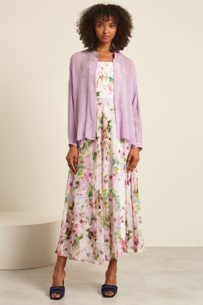 Blusa con spacchi laterali
