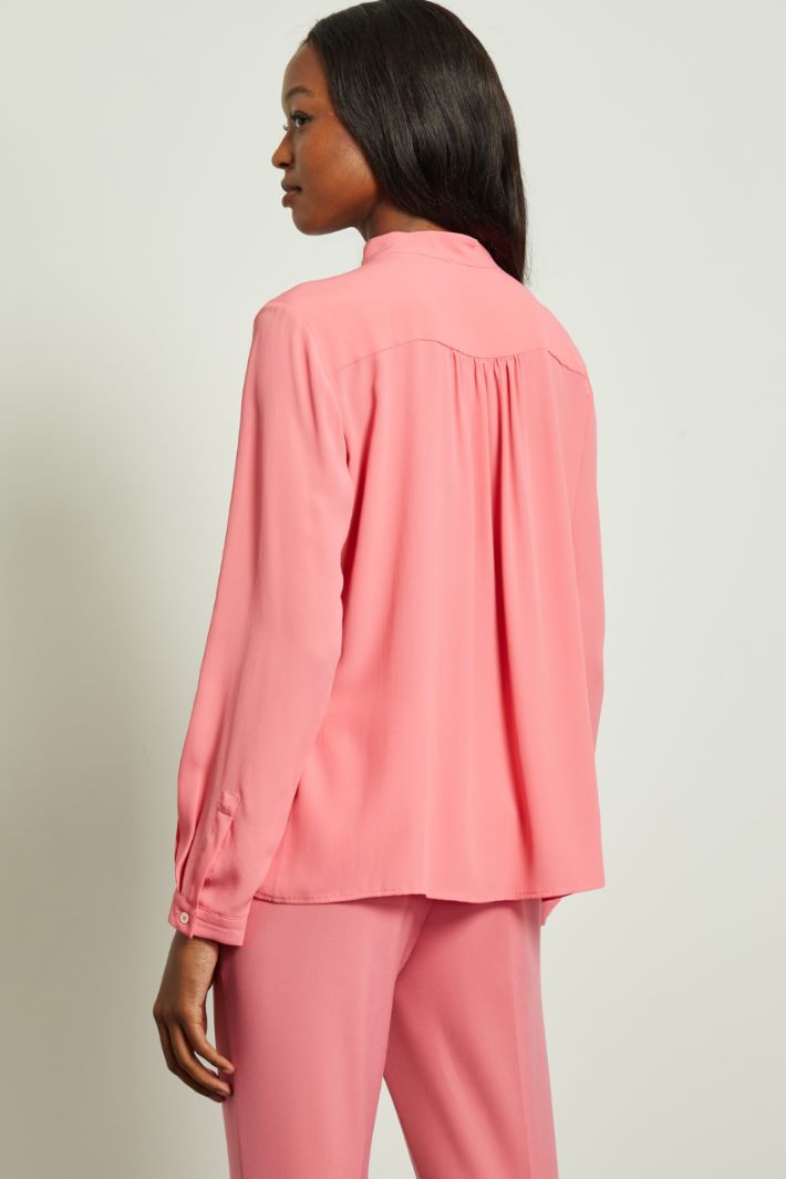 Blusa in crépe de chine
