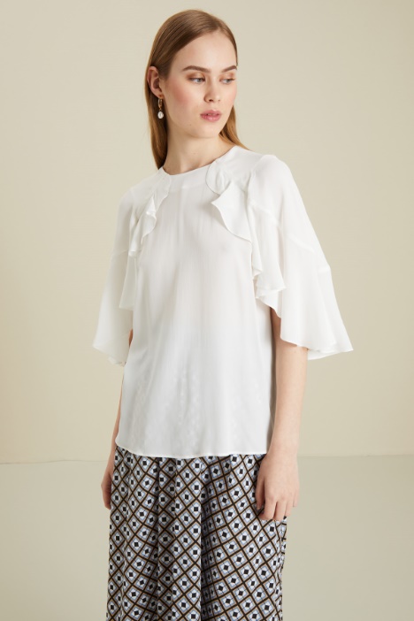 Blusa con volant Intrend