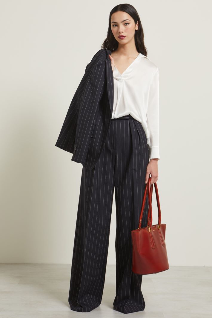 Blusa con colletto stile polo