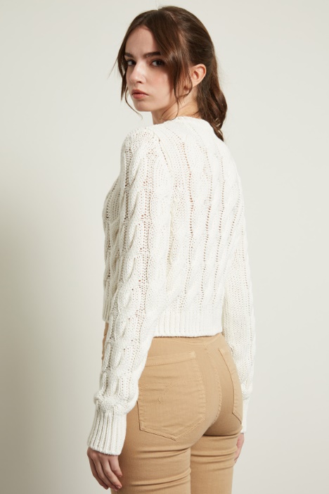 Maglia cropped a trecce