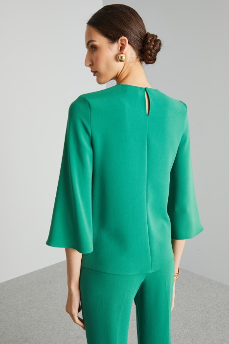 Blusa con passante in metallo