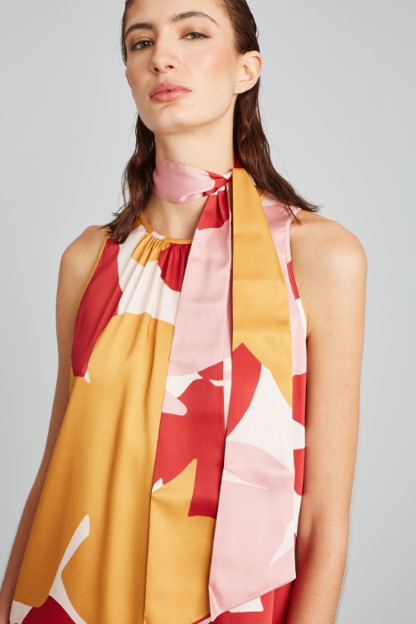 Top smanicato in twill