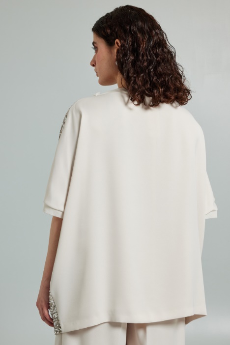 Top morbido con paillettes