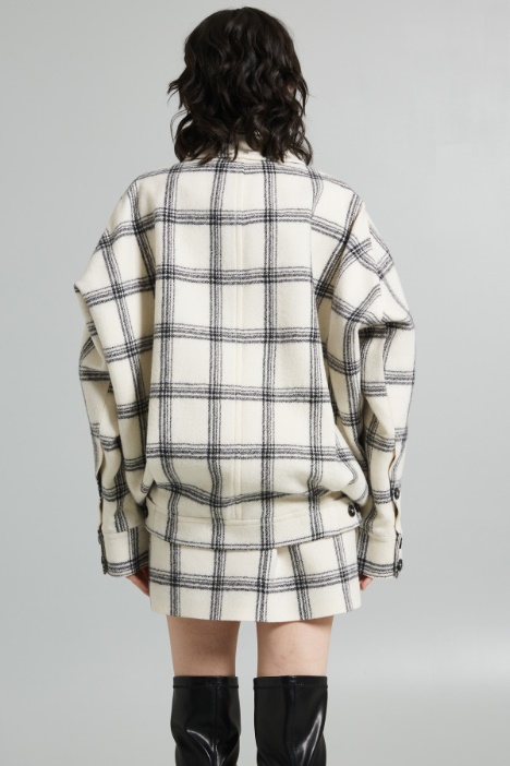 Giaccone con taschini