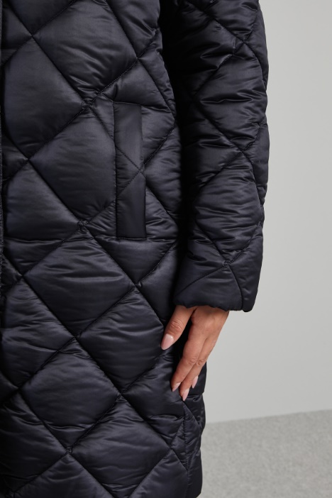 Imbottito con bottoni in tono