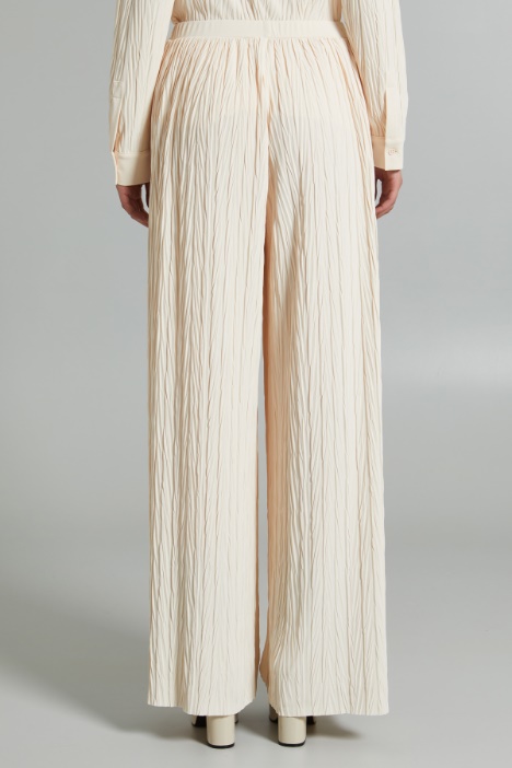 Pantaloni ampi in jersey plissè
