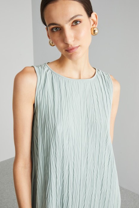 Top asimmetrico in jersey plissè