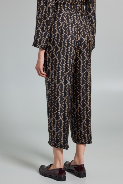 Pantaloni cropped in seta stampata