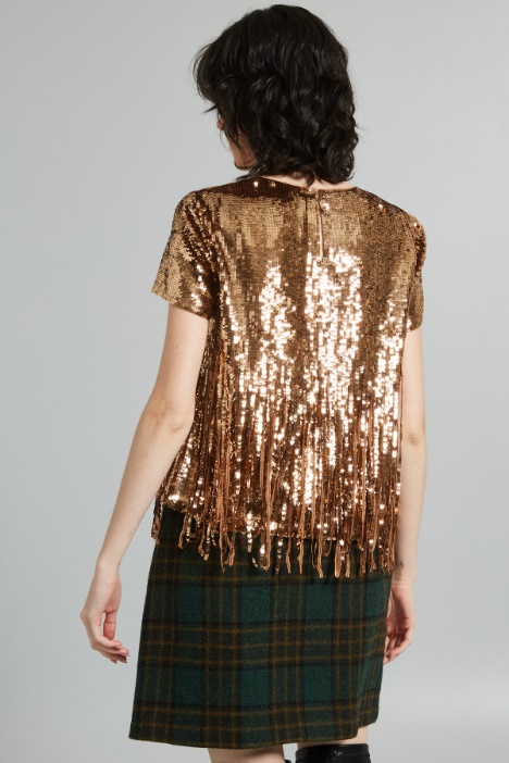 Top con paillettes e frange