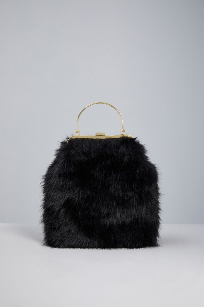 Faux fur clutch Intrend