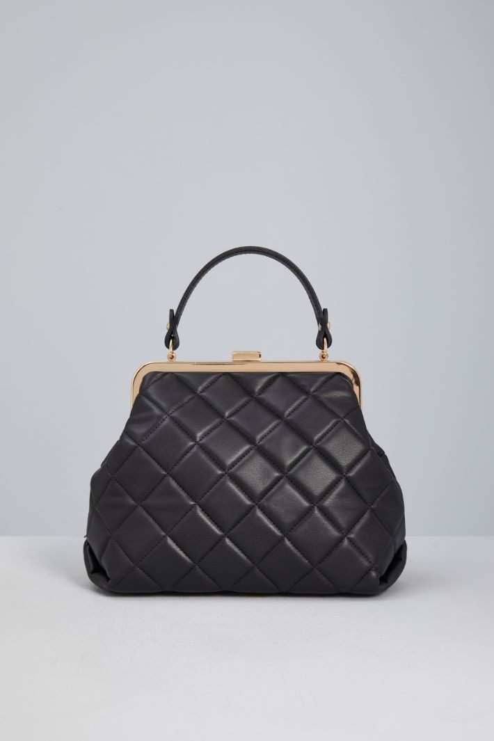 Quilted clutch Intrend