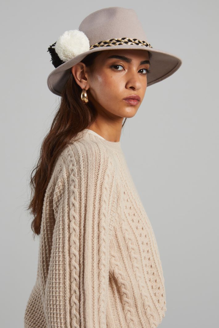 Fedora with braids and pom pom Intrend