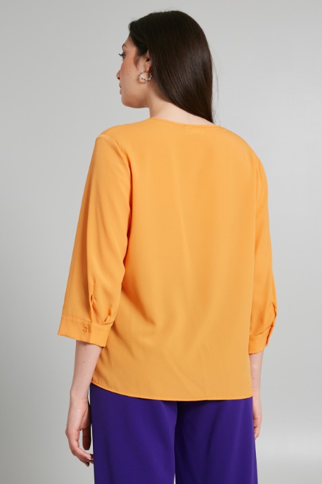 Blusa con contropiego