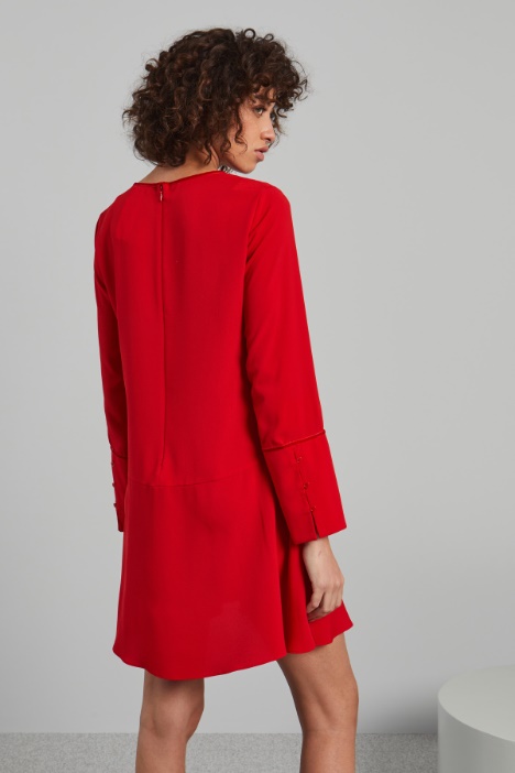 Abito con polsini alti