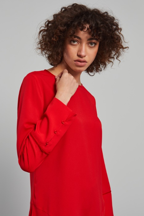 Abito con polsini alti