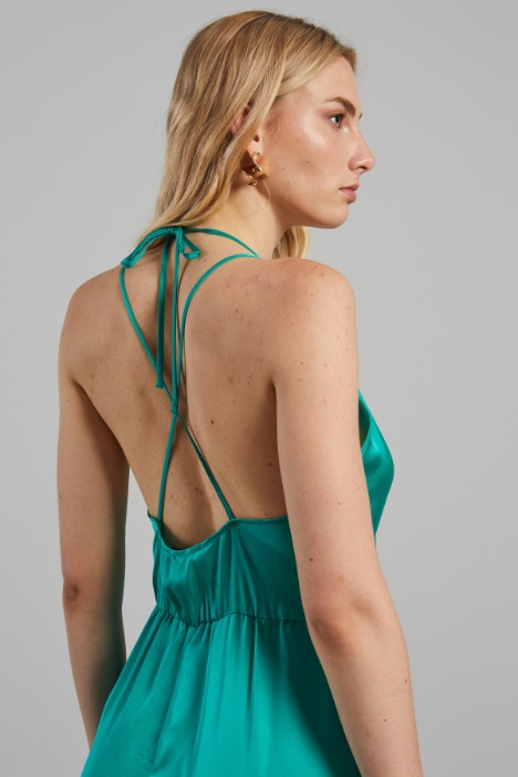 Tuta con spalline incrociate