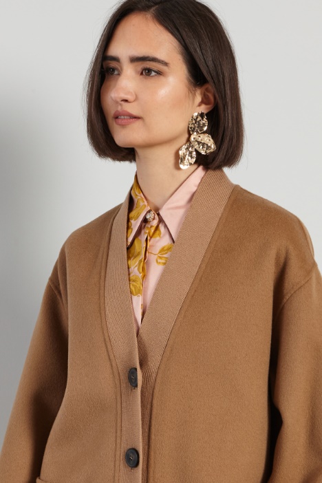 Giaccone con inserti in maglia