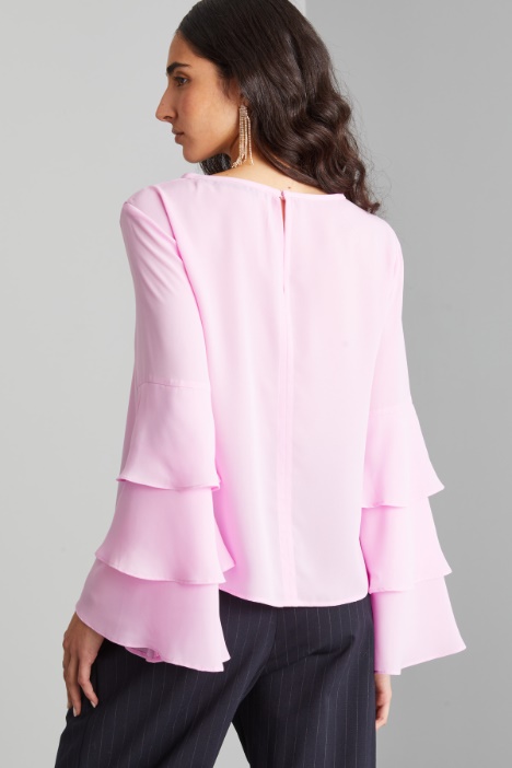 Blusa con maniche a campana