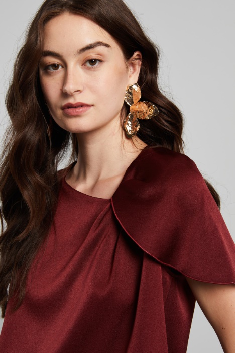 Blusa con drappeggio