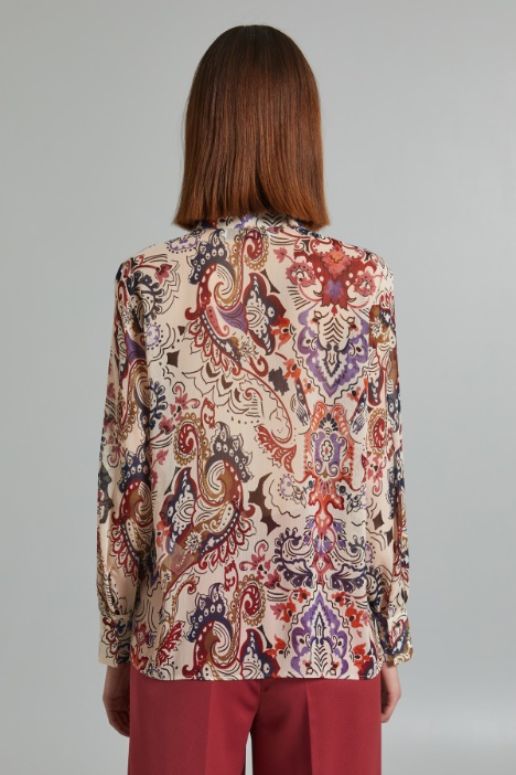 Blusa in creponne con volant