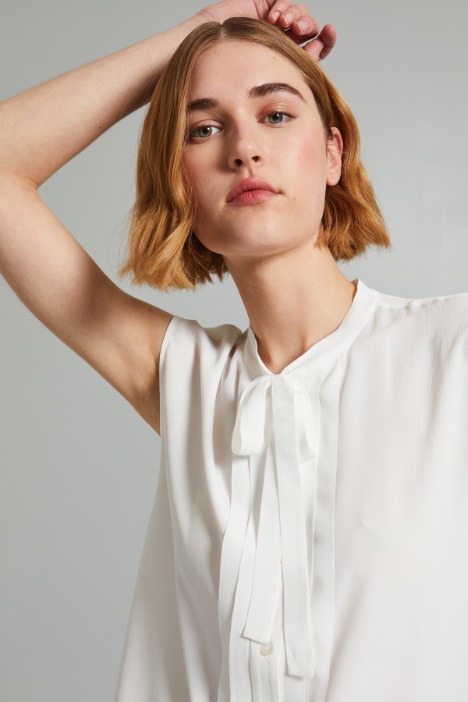 Blusa senza maniche