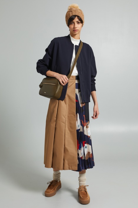 Cuffia a trecce con pon pon