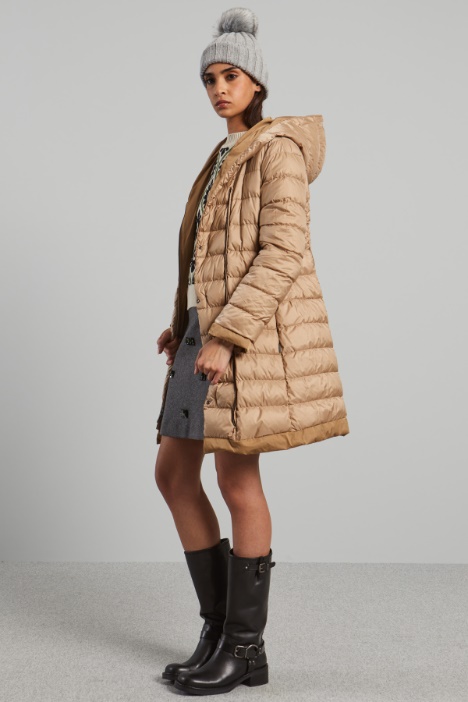 Cuffia a coste con pon pon